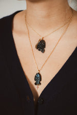 Pendentif poisson